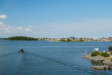 A small boat taking to sea